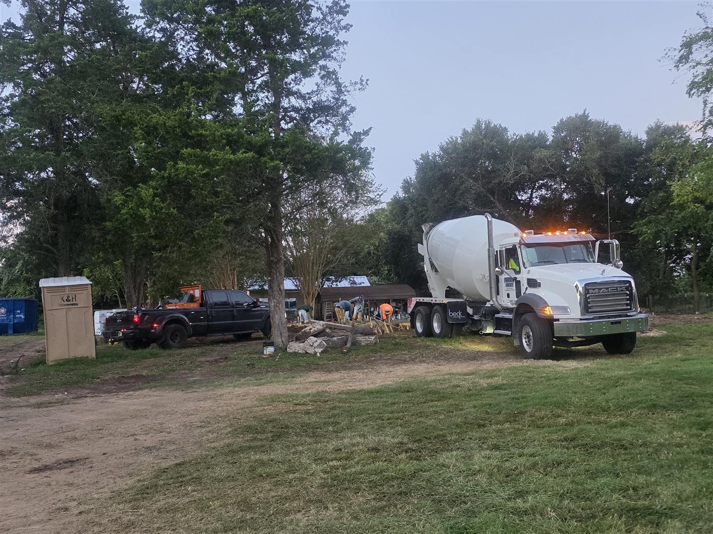 Concrete truck arriving at dawn